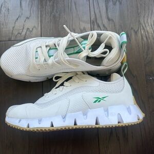 Woman’s Reebok White and Green Sneakers